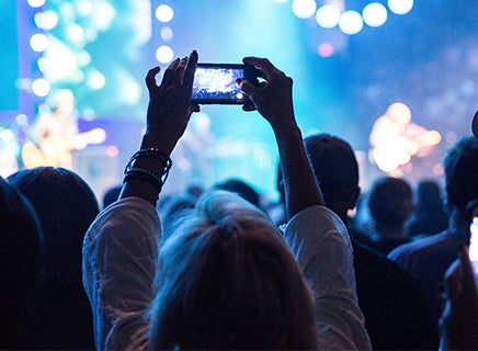 Fan Taking a Picture